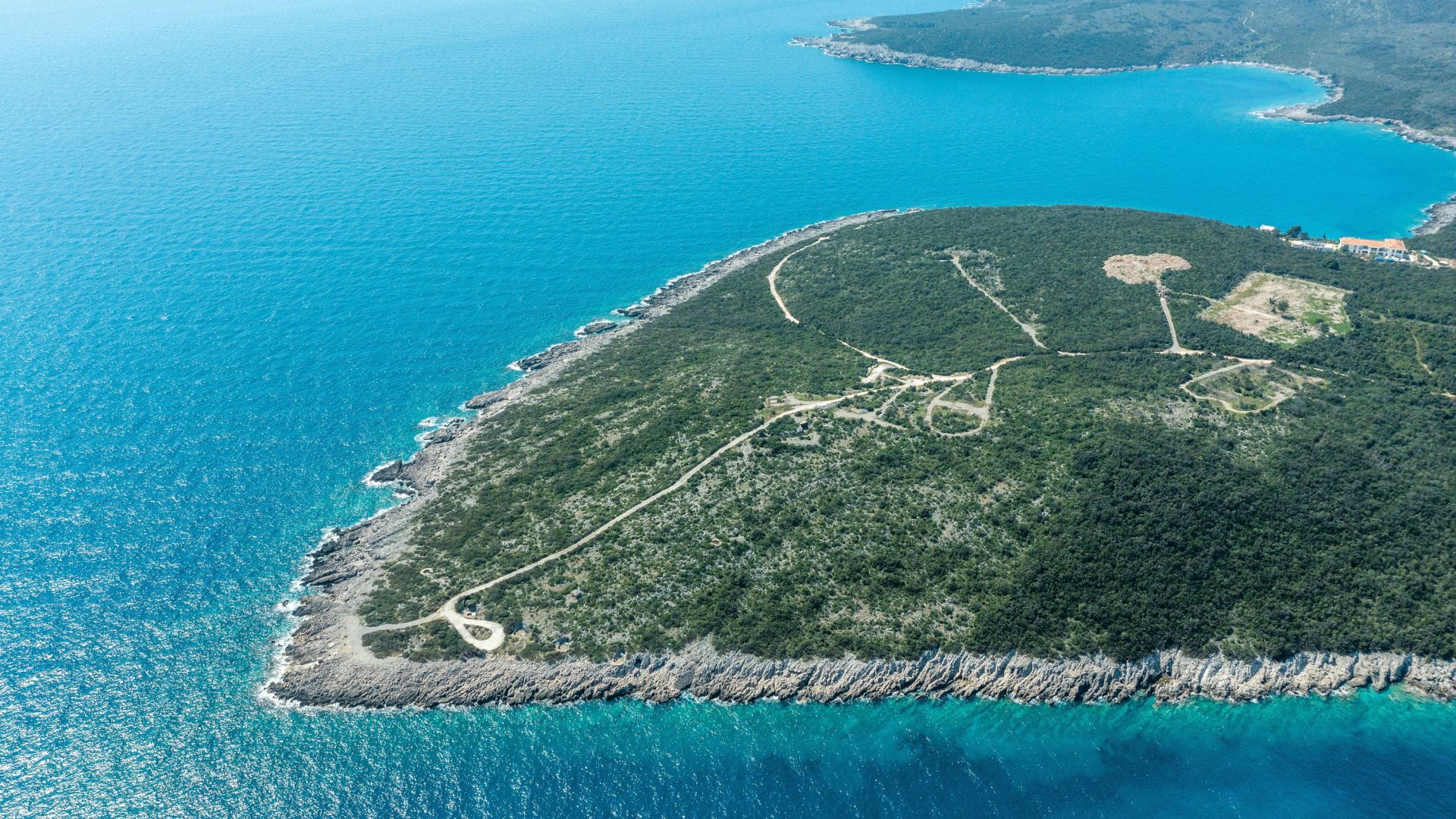 An Aerial View Of A Beach And Ocean