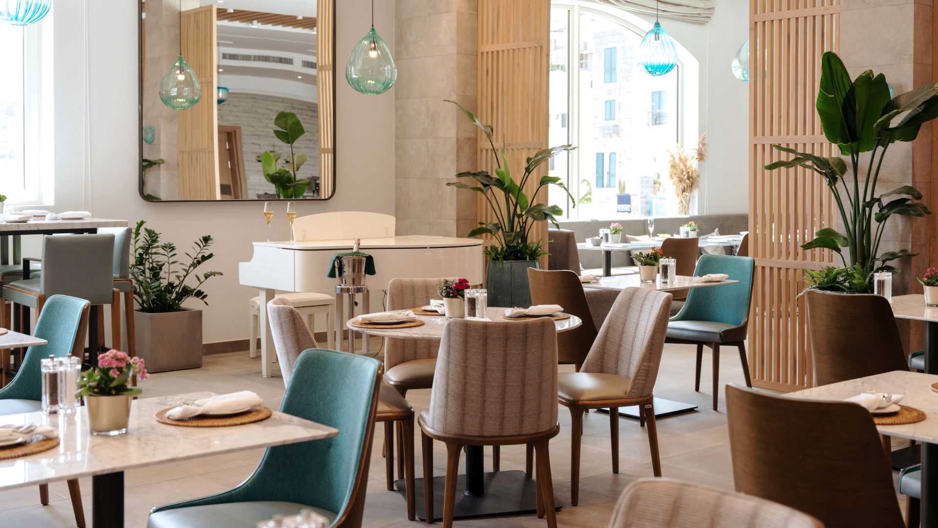 A Room With Tables And Chairs